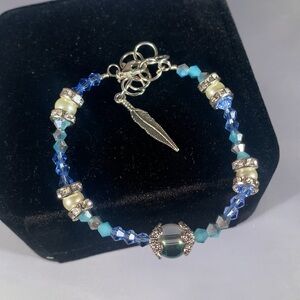 CELESTIDE - Designer Glass Beaded Artisan Bracelet w Copper Wire & Feather Charm